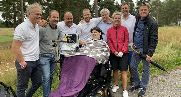 Marcusgolfen 2019. Johan Tranberg, Andreas Öst, Björn Eriksson, Oskar Strandlund, Fredrik Larsson, Sara Thorén, Anders Magnusson, Fredrik Jäverström och Marcus Stjernlöf i permobilen.